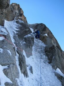 Me leading the first steeper ice pitch