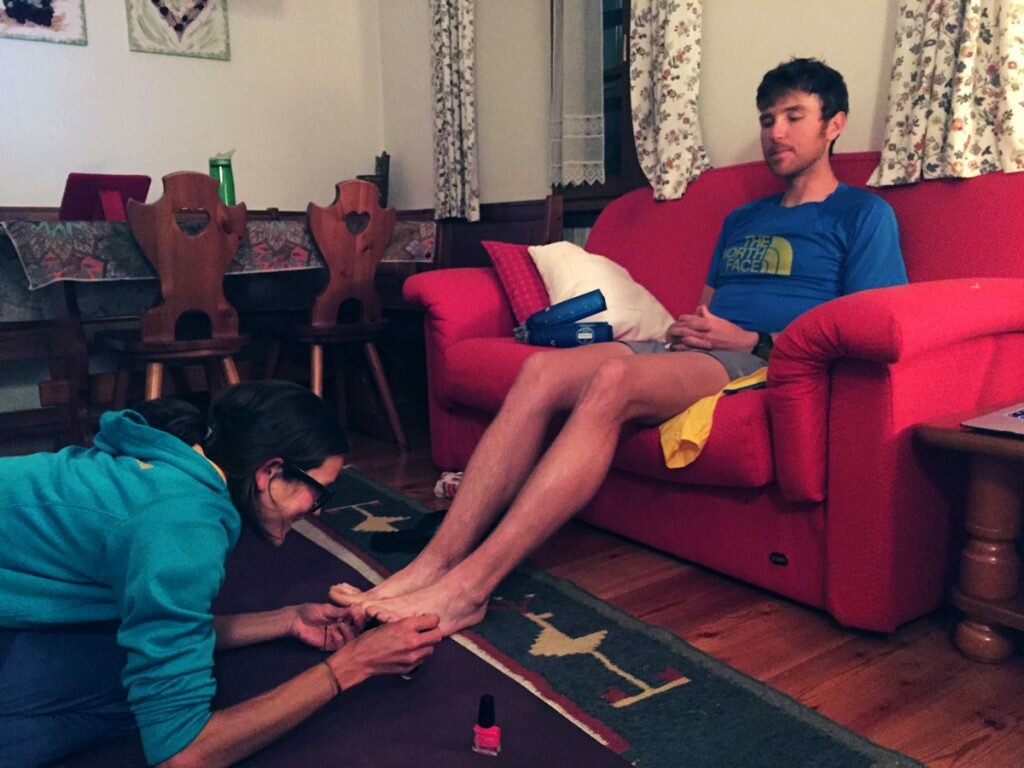 Rory Bosio painting Mike's toes for race luck!