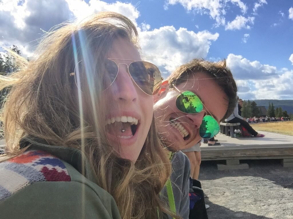 Being tourists waiting for Old Faithful
